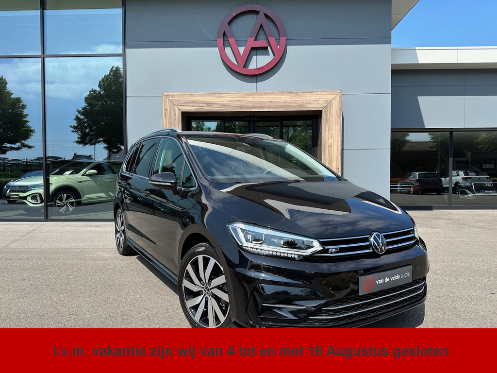 tweedehands Volkswagen Touran 1.5 TSI 150pk DSG R-line Highline | Led | Trekhaak | Dode hoek | Camera | Keyless | Rijklaar incl. garantie   – beschikbaar bij Van de Velde Auto’s