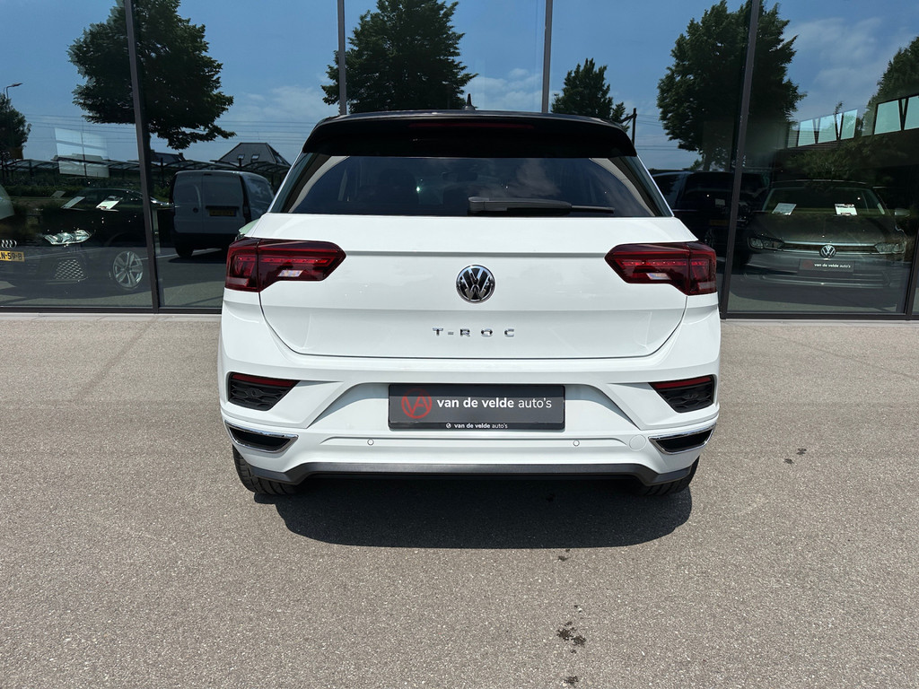 tweedehands Volkswagen T-Roc 1.5 TSI 150pk DSG R-line | 19 inch | Led | Trekhaak | Virtual cockpit | Carplay | Rijklaar incl. 1 jaar Bovag garantie   – beschikbaar bij Van de Velde Auto’s