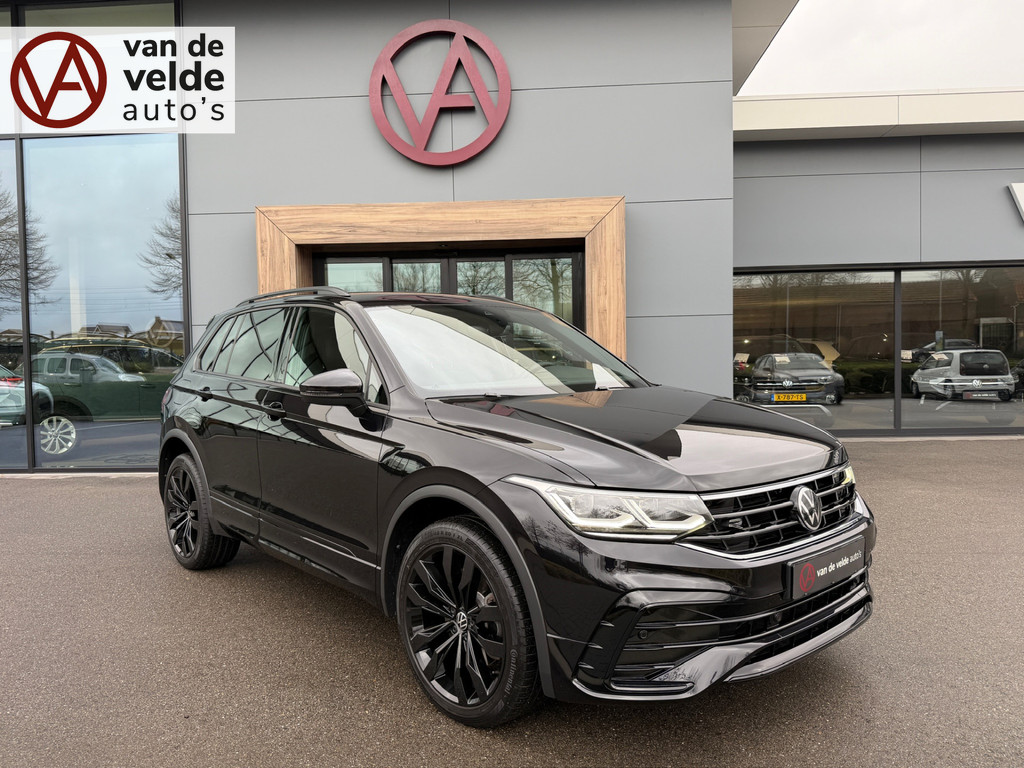 tweedehands Volkswagen Tiguan 1.4 TSI eHybrid 245pk R-Line | Black style | 20 inch | Camera | Discover Pro | IQ light | Elek. Achterklep | Rijklaar incl. gara   – beschikbaar bij Van de Velde Auto’s