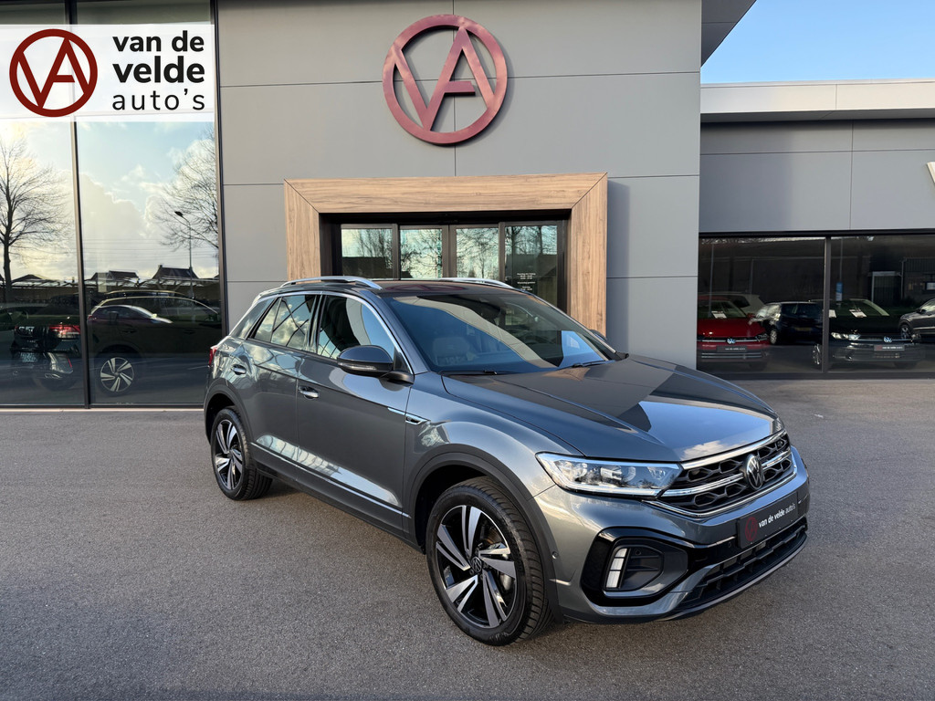 tweedehands Volkswagen T-Roc 1.5 TSI 150pk DSG R-Line | Camera | Keyless | Elek. Achterklep | Dode hoek | Rijklaar incl. 1 jaar Bovag garantie   – beschikbaar bij Van de Velde Auto’s