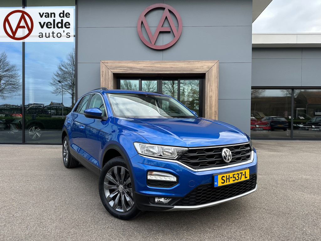 tweedehands Volkswagen T-Roc 1.5 TSI 150pk Style | Trekhaak | Navi | Camera | Carplay | Adap. Cruise | Rijklaar incl. 1 jaar Bovag garantie   – beschikbaar bij Van de Velde Auto’s