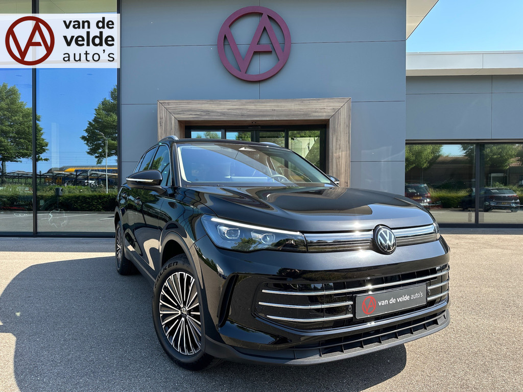 tweedehands Volkswagen Tiguan 1.5 eHybrid Elegance 204pk | Trekhaak | Camera | Head-up | All-season | Dode hoek | Elek. klep | incl. verlengde garantie   – beschikbaar bij Van de Velde Auto’s