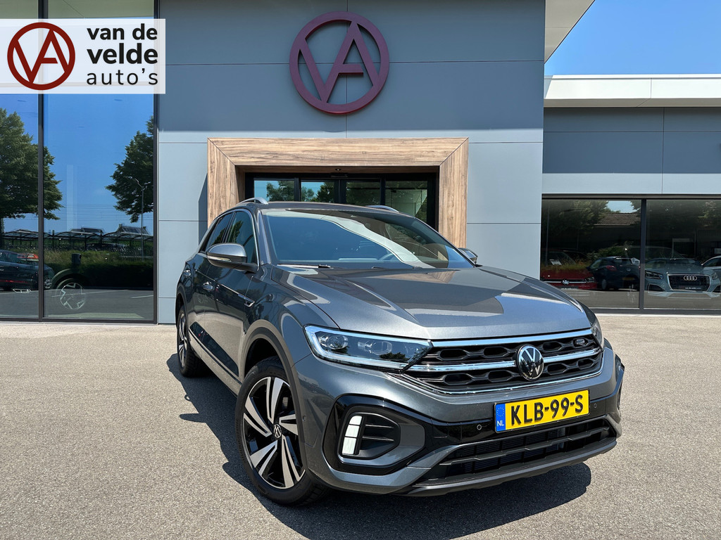 tweedehands Volkswagen T-Roc 1.5 TSI 150pk DSG R-Line | Camera | Keyless | Elek. Achterklep | Dode hoek | Rijklaar incl. 1 jaar Bovag garantie   – beschikbaar bij Van de Velde Auto’s