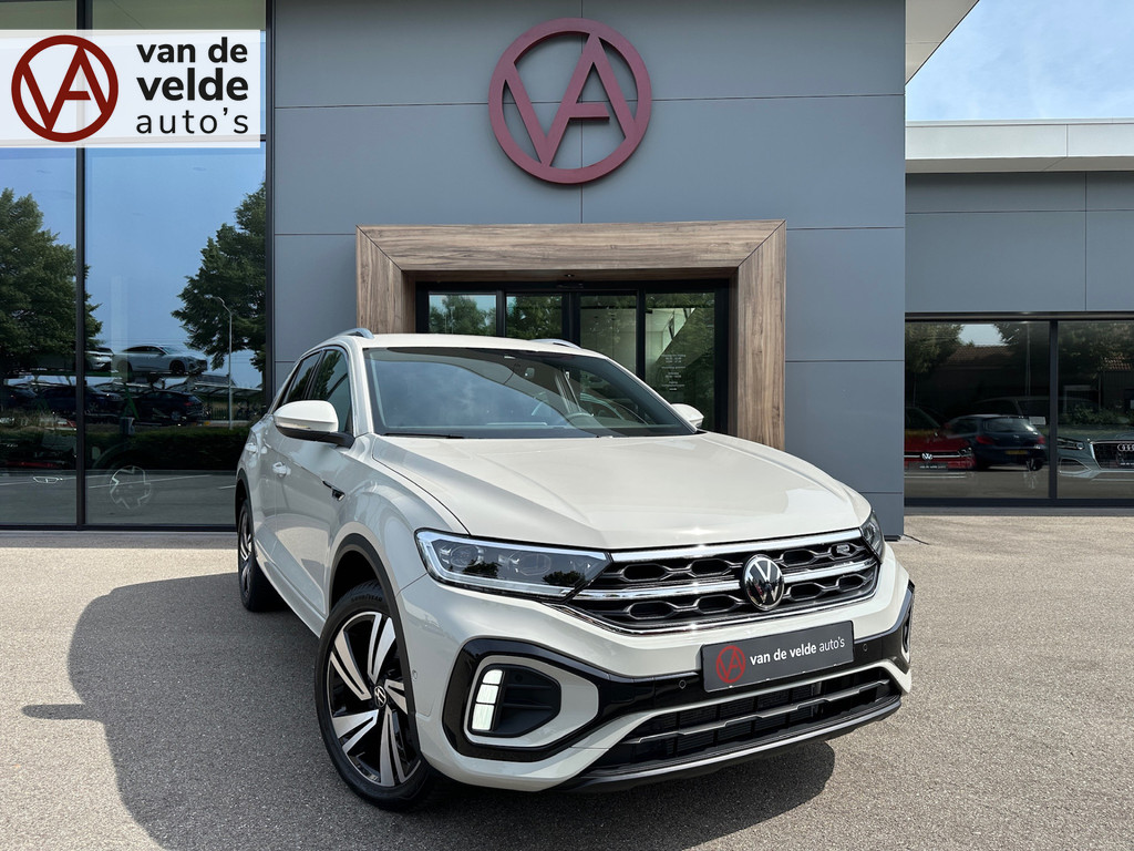 tweedehands Volkswagen T-Roc 1.5 TSI 150pk DSG R-Line | Camera | Keyless | Elek. Achterklep | Dode hoek | Rijklaar incl. 1 jaar Bovag garantie   – beschikbaar bij Van de Velde Auto’s