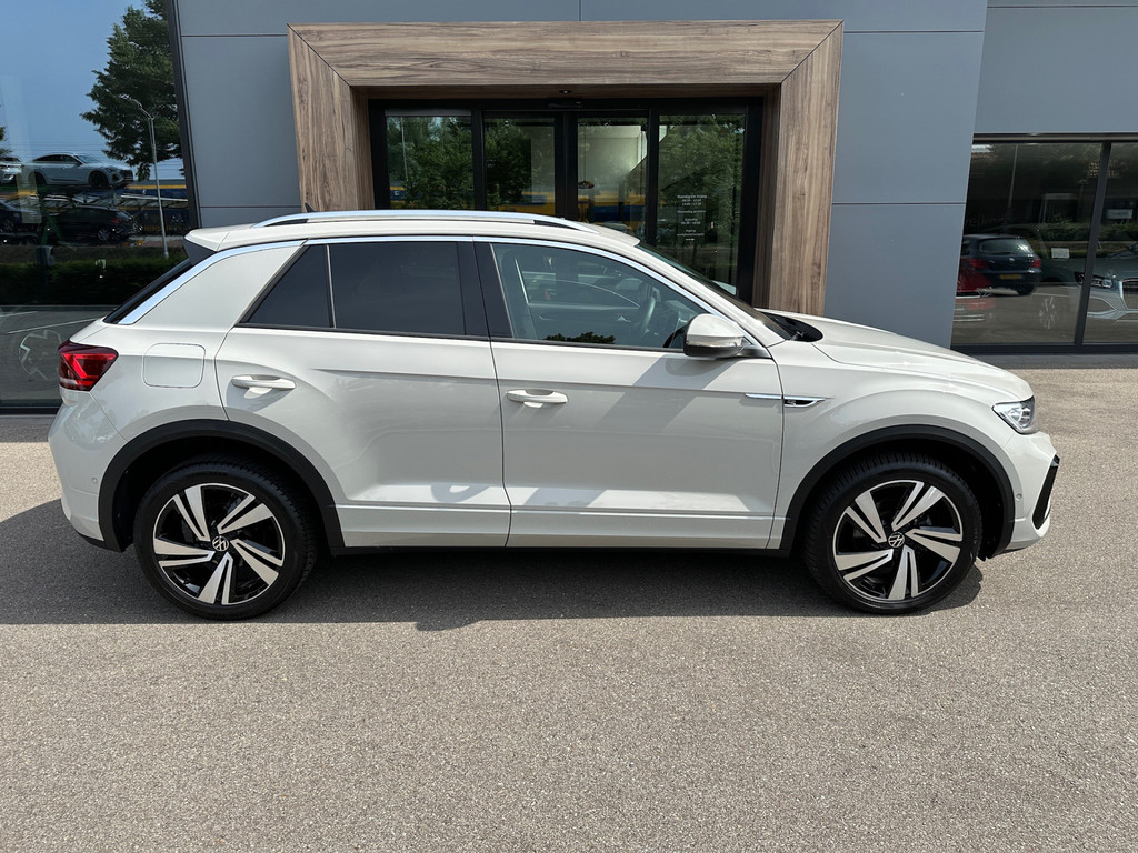 tweedehands Volkswagen T-Roc 1.5 TSI 150pk DSG R-Line | Camera | Keyless | Elek. Achterklep | Dode hoek | Rijklaar incl. 1 jaar Bovag garantie   – beschikbaar bij Van de Velde Auto’s