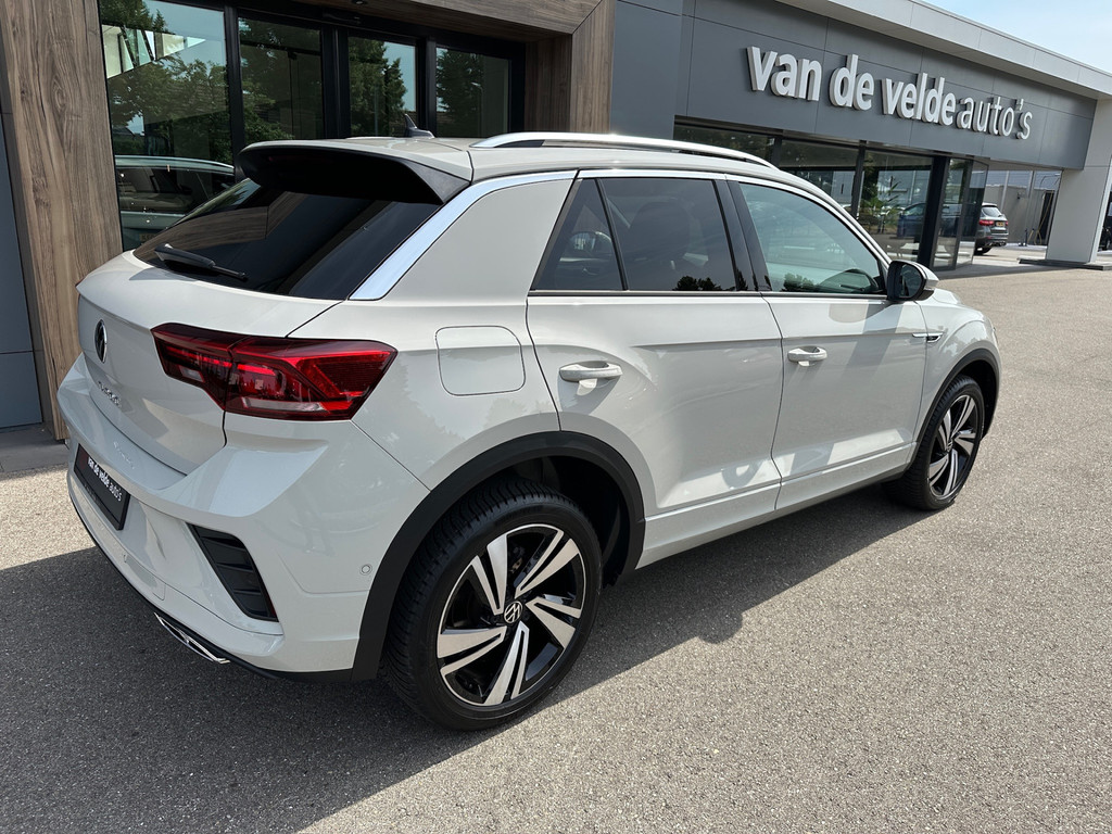 tweedehands Volkswagen T-Roc 1.5 TSI 150pk DSG R-Line | Camera | Keyless | Elek. Achterklep | Dode hoek | Rijklaar incl. 1 jaar Bovag garantie   – beschikbaar bij Van de Velde Auto’s